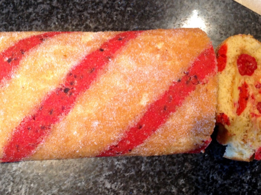 Passionfruit and raspberry swiss roll