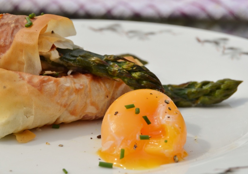 Asparagus wrapped in phyllo: this time with goats cheese inside, with poached egg yolk to dip into
